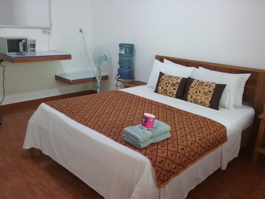 Putri Homestay Гили-Мено Экстерьер фото